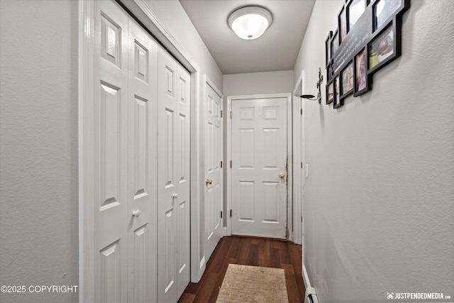 6801 E Tudor Rd, Anchorage, AK 99507 - corridor featuring dark wood-type flooring