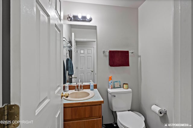 6801 E Tudor Rd, Anchorage, AK 99507 - bathroom with vanity and toilet