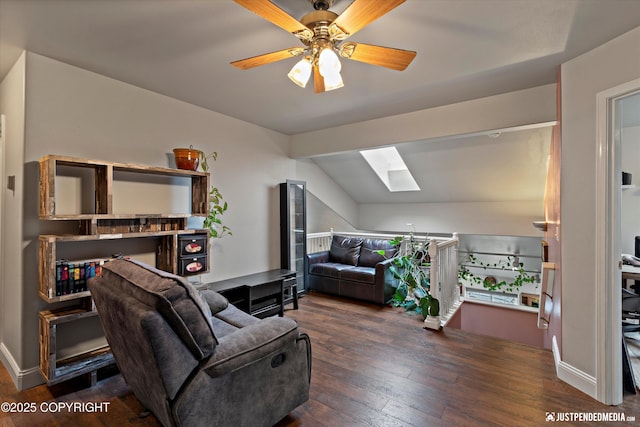 6801 E Tudor Rd, Anchorage, AK 99507 - living area with ceiling fan, hardwood / wood-style floors, and vaulted ceiling with skylight