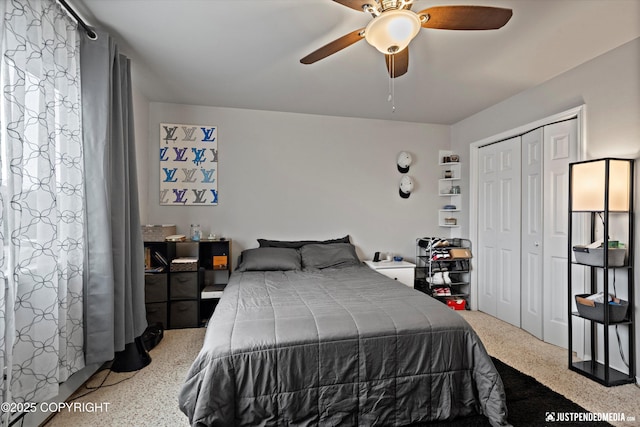 6801 E Tudor Rd, Anchorage, AK 99507 - bedroom with a closet, speckled floor, and ceiling fan
