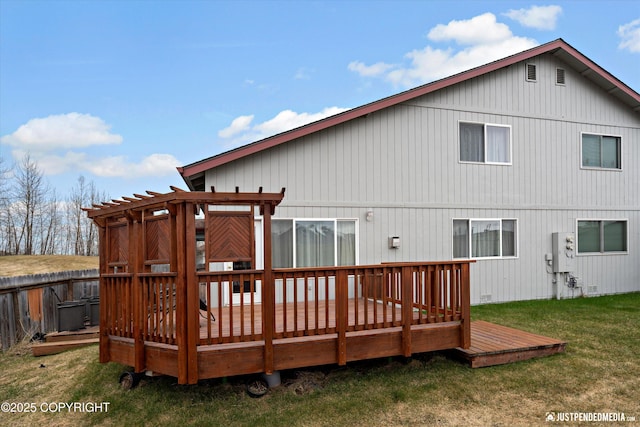 6801 E Tudor Rd, Anchorage, AK 99507 - rear view of house with a lawn, a deck, a pergola, and fence