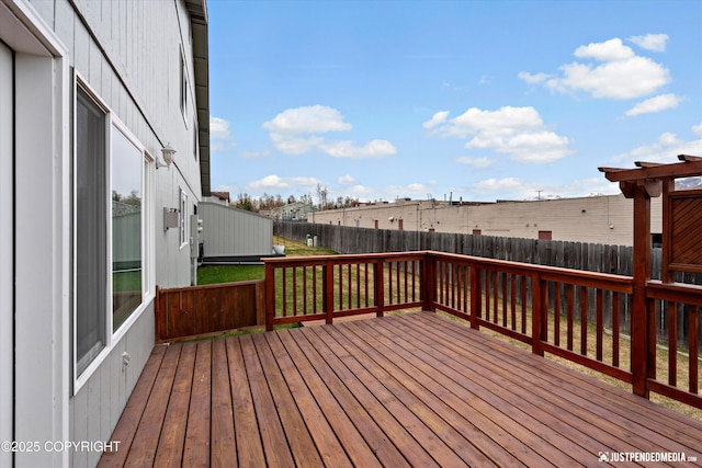 6801 E Tudor Rd, Anchorage, AK 99507 - wooden terrace with a fenced backyard