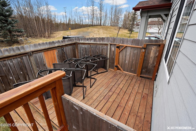 6801 E Tudor Rd, Anchorage, AK 99507 - wooden terrace featuring fence