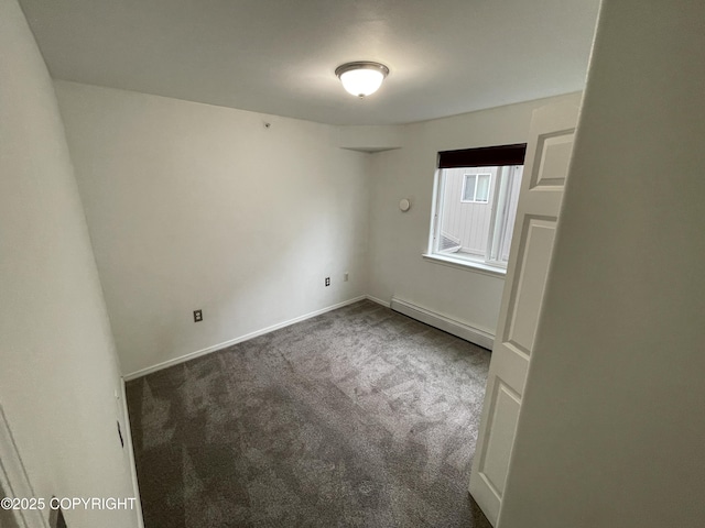 123 E 24th Ave # 4, Anchorage, AK 99503 - carpeted spare room with baseboard heating and baseboards
