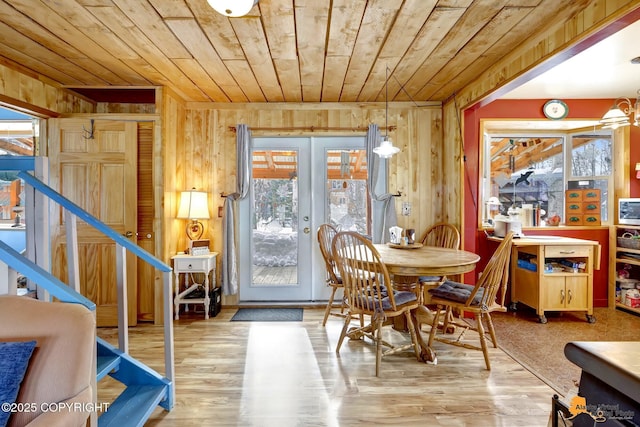 13706 E First St, Talkeetna, AK 99676 - dining area featuring wood ceiling, wood walls, french doors, and wood finished floors