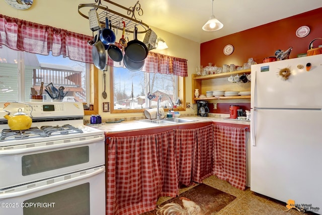 13706 E First St, Talkeetna, AK 99676 - kitchen with white appliances and light countertops
