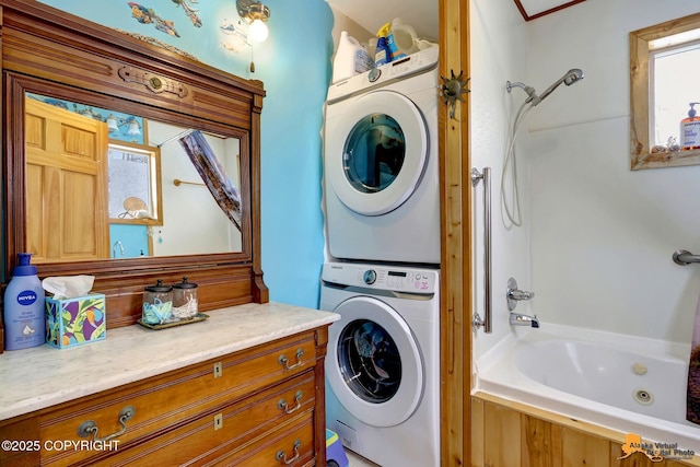 13706 E First St, Talkeetna, AK 99676 - laundry area featuring stacked washer / dryer and healthy amount of natural light