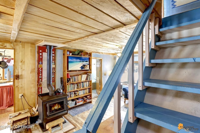13706 E First St, Talkeetna, AK 99676 - staircase with a wood stove and wood ceiling