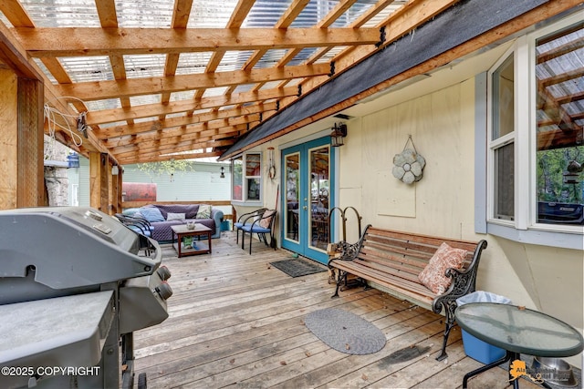 13706 E First St, Talkeetna, AK 99676 - wooden terrace with french doors, outdoor lounge area, a pergola, and grilling area