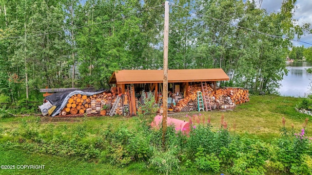 2643 S Rory Cir, Big Lake, AK 99654 - view of front of house with a water view and a front yard