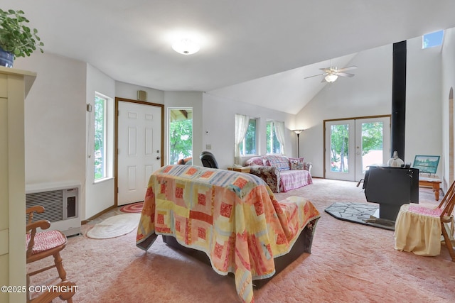2643 S Rory Cir, Big Lake, AK 99654 - living room featuring heating unit, a ceiling fan, french doors, carpet floors, and high vaulted ceiling
