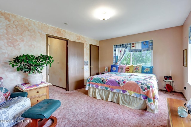 2643 S Rory Cir, Big Lake, AK 99654 - bedroom with wallpapered walls, light carpet, and baseboards