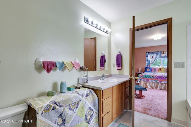 2643 S Rory Cir, Big Lake, AK 99654 - bathroom with ensuite bath, vanity, and toilet