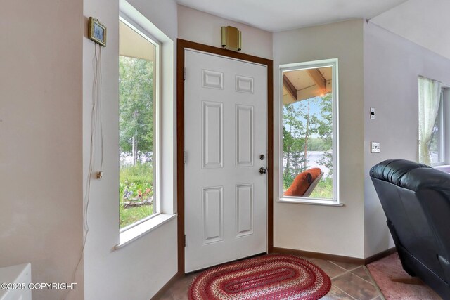 2643 S Rory Cir, Big Lake, AK 99654 - entrance foyer featuring tile patterned flooring and baseboards