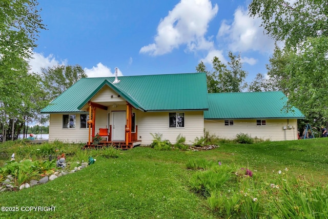 2643 S Rory Cir, Big Lake, AK 99654 - view of front facade with a front lawn and metal roof
