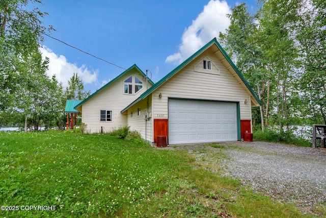 2643 S Rory Cir, Big Lake, AK 99654 - view of front facade with a front yard and driveway
