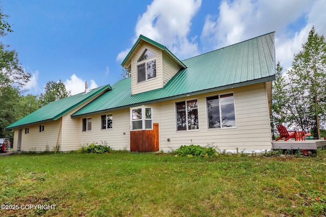 2643 S Rory Cir, Big Lake, AK 99654 - view of front of house featuring metal roof, a front yard, and a wooden deck
