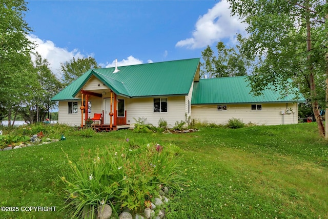 2643 S Rory Cir, Big Lake, AK 99654 - view of front of property featuring a front yard and metal roof