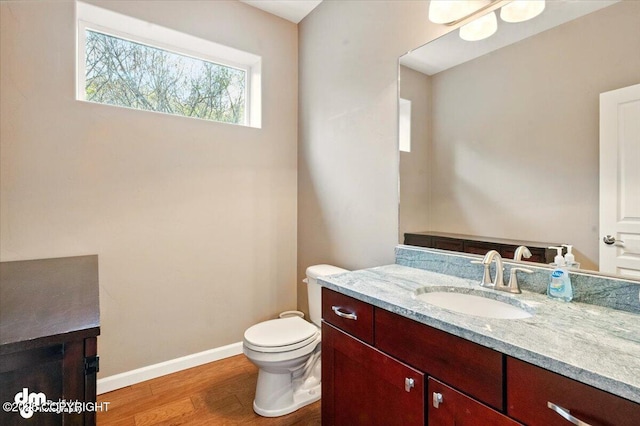 18627 Mountain Plover Cir, Anchorage, AK 99516 - half bathroom with vanity and wood finished floors