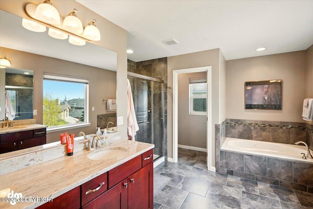 18627 Mountain Plover Cir, Anchorage, AK 99516 - full bathroom with vanity, a stall shower, a bath, stone finish flooring, and recessed lighting
