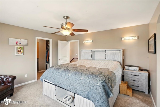 18627 Mountain Plover Cir, Anchorage, AK 99516 - bedroom featuring light colored carpet, a spacious closet, a ceiling fan, and a closet