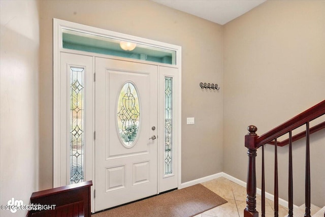 18627 Mountain Plover Cir, Anchorage, AK 99516 - tiled foyer with stairs and baseboards