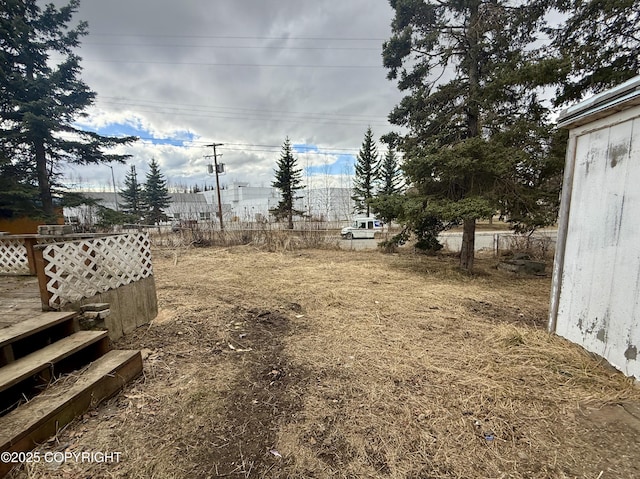 view of yard with fence