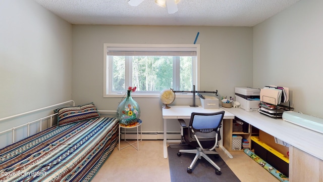 interior space with baseboard heating, ceiling fan, and a textured ceiling