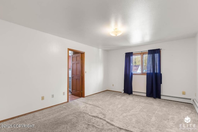 unfurnished room with a baseboard radiator, carpet, and baseboards
