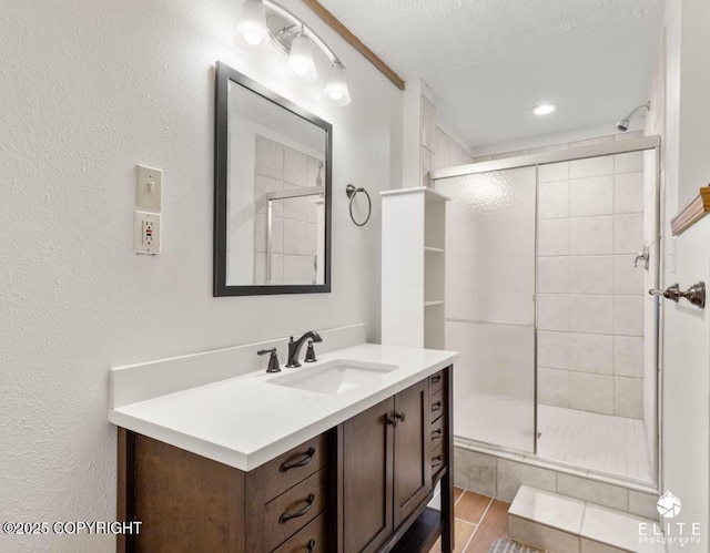 bathroom with vanity, a stall shower, and recessed lighting