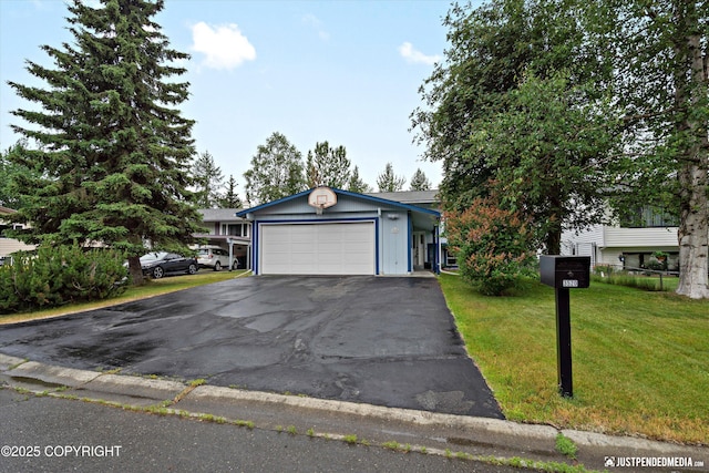 3520 Glenn-Don Cir, Anchorage, AK 99504 - view of front of house featuring asphalt driveway, a garage, and a front lawn