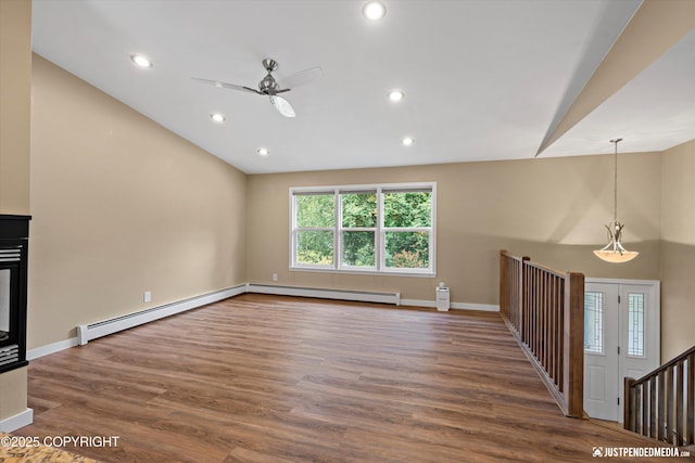 3520 Glenn-Don Cir, Anchorage, AK 99504 - unfurnished living room with lofted ceiling, a baseboard heating unit, a ceiling fan, wood finished floors, and recessed lighting