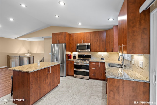 3520 Glenn-Don Cir, Anchorage, AK 99504 - kitchen featuring stainless steel appliances, lofted ceiling, a center island, light stone countertops, and backsplash