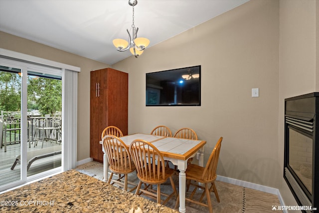 3520 Glenn-Don Cir, Anchorage, AK 99504 - dining space with a chandelier and baseboards