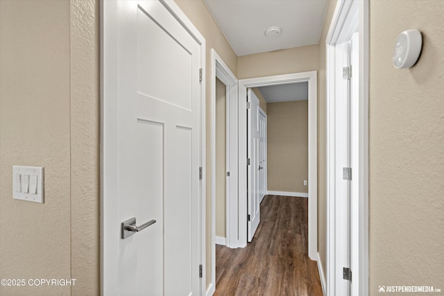 3520 Glenn-Don Cir, Anchorage, AK 99504 - corridor featuring dark wood finished floors and baseboards