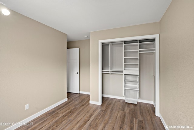 3520 Glenn-Don Cir, Anchorage, AK 99504 - unfurnished bedroom with wood finished floors and a closet