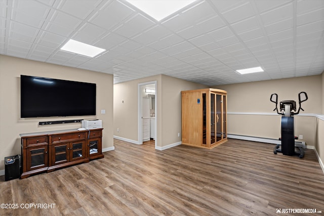 3520 Glenn-Don Cir, Anchorage, AK 99504 - unfurnished living room featuring wood finished floors and baseboard heating