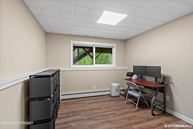 3520 Glenn-Don Cir, Anchorage, AK 99504 - home office featuring a baseboard radiator and wood finished floors