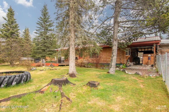 265 Ames Rd, Kenai, AK 99611 - view of green lawn with a wooden deck