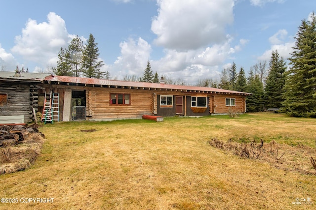 265 Ames Rd, Kenai, AK 99611 - back of house featuring a lawn, log siding, and metal roof