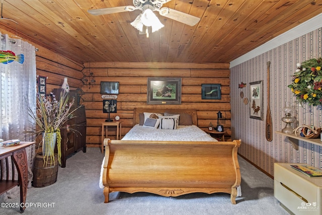 265 Ames Rd, Kenai, AK 99611 - carpeted bedroom with wallpapered walls, wood ceiling, and rustic walls