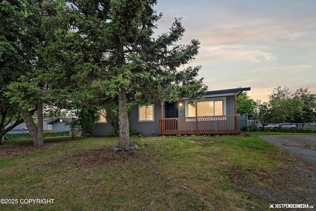 3722 E 19th Ave, Anchorage, AK 99508 - obstructed view of property featuring a lawn