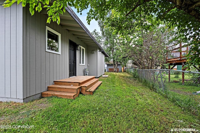 3722 E 19th Ave, Anchorage, AK 99508 - fenced backyard with a deck