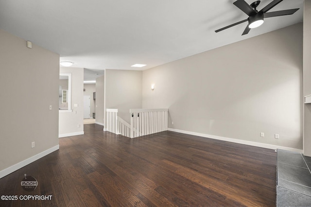2563 La Honda Dr, Anchorage, AK 99517 - empty room with wood finished floors, a ceiling fan, and baseboards