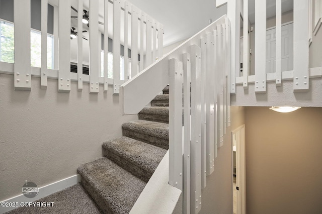 2563 La Honda Dr, Anchorage, AK 99517 - staircase featuring baseboards
