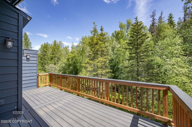 2563 La Honda Dr, Anchorage, AK 99517 - wooden terrace featuring a view of trees