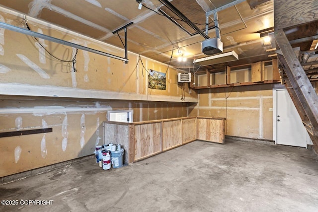 3921 Patricia Ln, Anchorage, AK 99504 - garage featuring a garage door opener