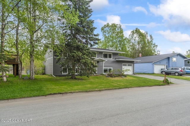 3921 Patricia Ln, Anchorage, AK 99504 - view of front facade with concrete driveway, an attached garage, and a front lawn