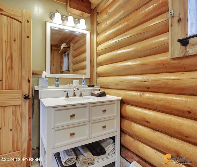 19180 Beverly Ave, Chugiak, AK 99567 - bathroom featuring vanity and log walls