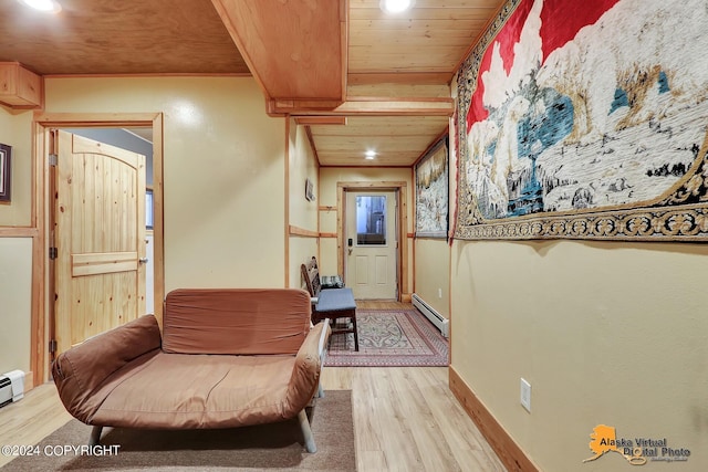 19180 Beverly Ave, Chugiak, AK 99567 - hallway with light wood finished floors, baseboard heating, wood ceiling, and recessed lighting